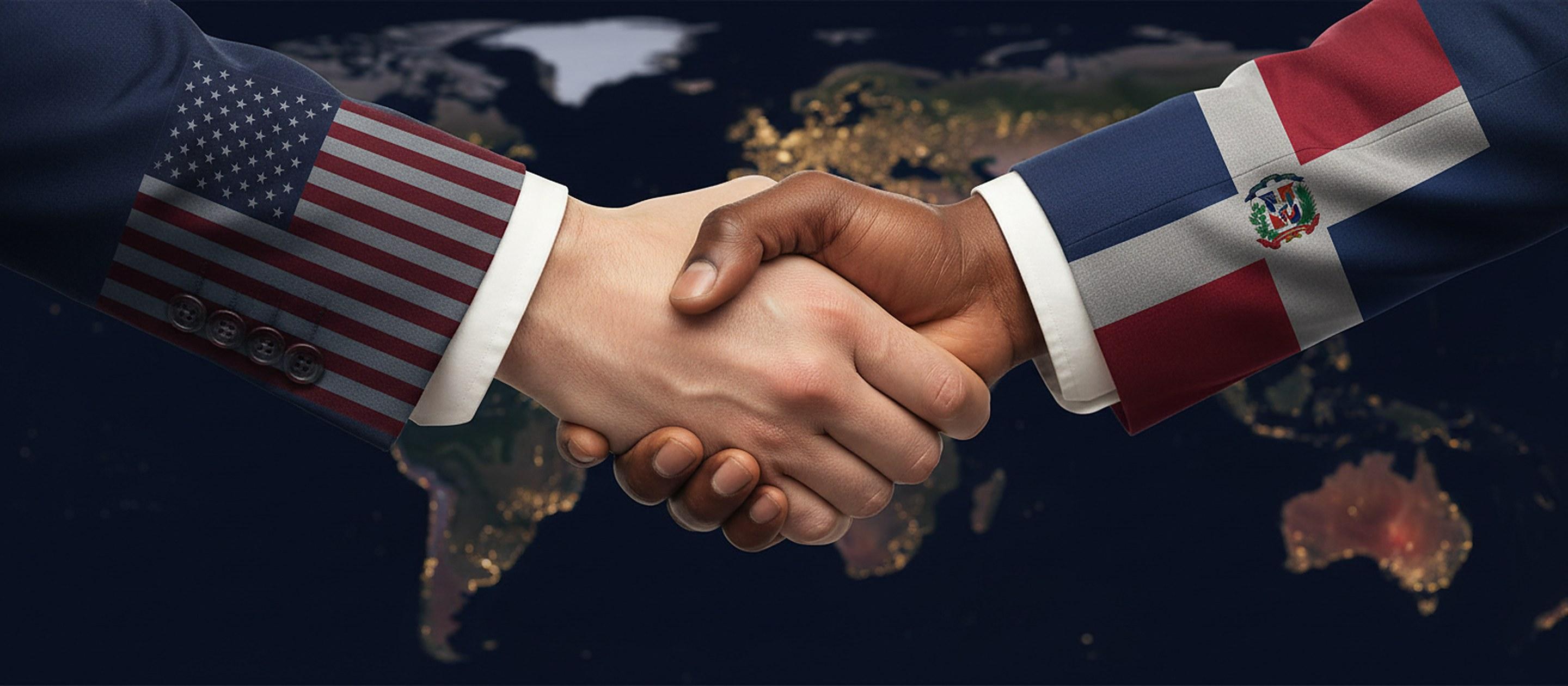 Un apretón de manos entre un socio estadounidense y uno dominicano, con sus banderas en los puños, sobre una vista nocturna de las Américas